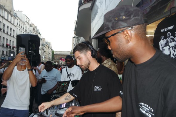 Paris street set, daytime, crowd